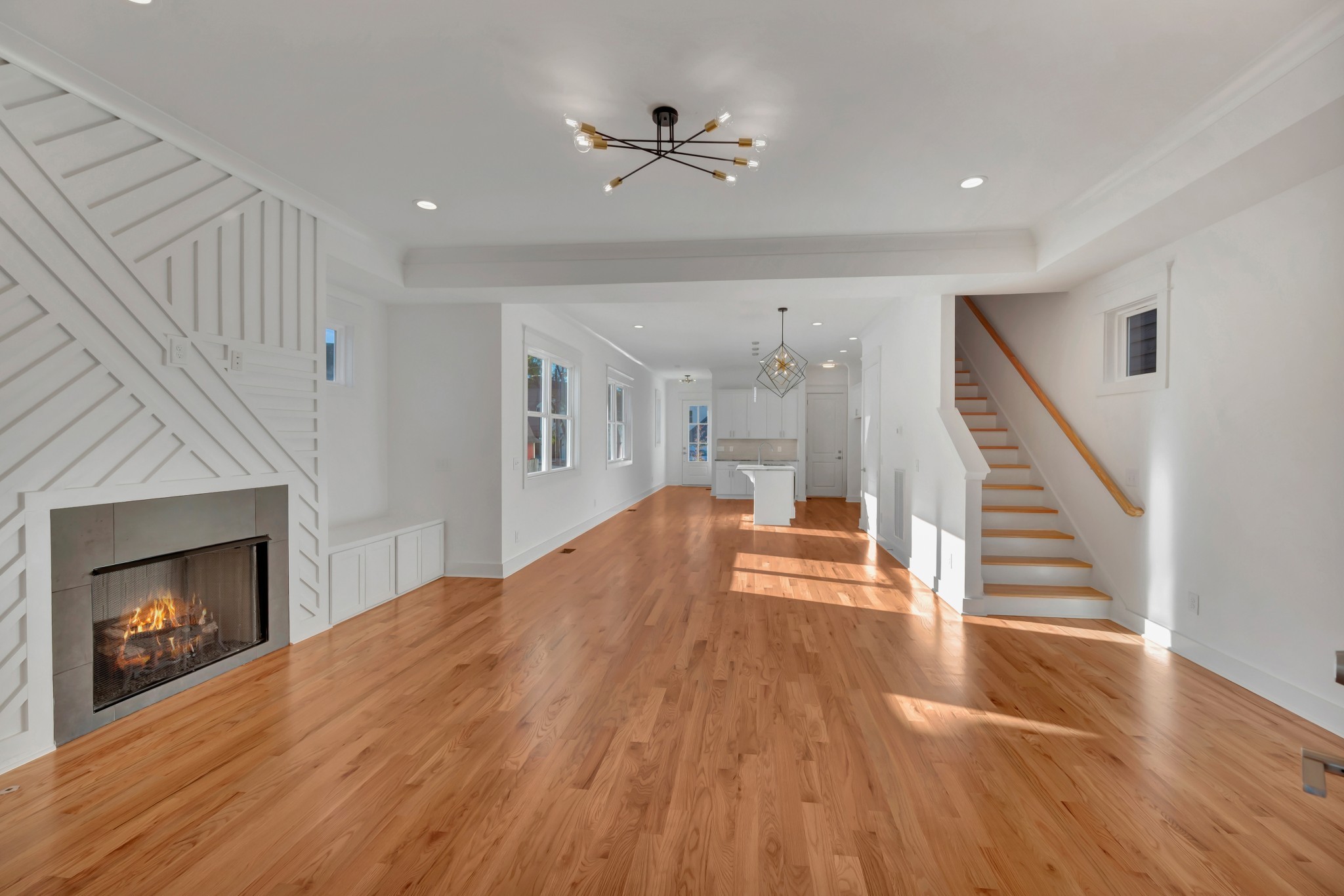 520 Croley Drive, Unit A (RIGHT SIDE) Nashville, TN 37209 - Photo 18 of 39 a view of a livingroom with wooden floor fireplace and stairs