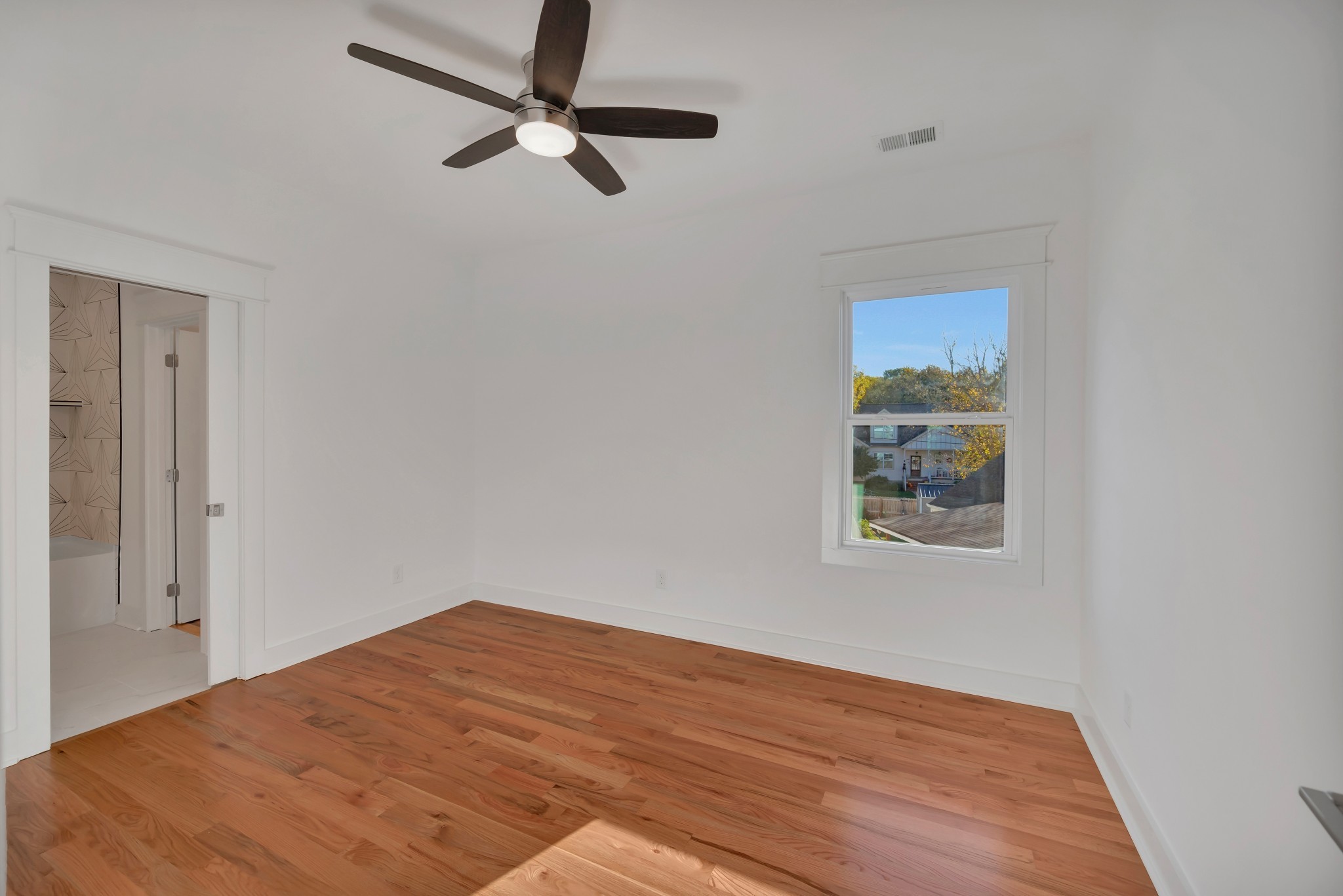 520 Croley Drive, Unit A (RIGHT SIDE) Nashville, TN 37209 - Photo 19 of 39 a view of empty room with wooden floor