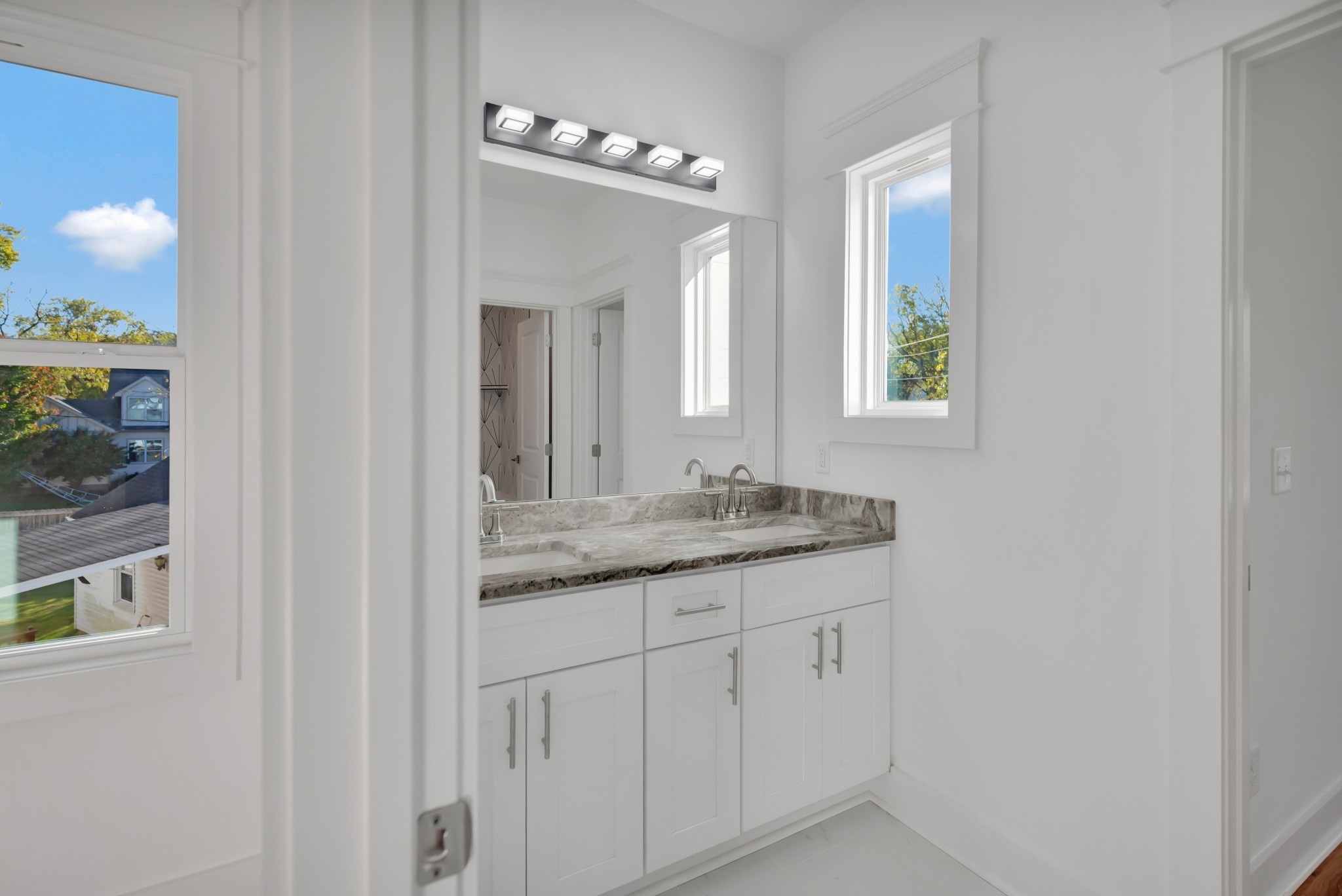 520 Croley Drive, Unit A (RIGHT SIDE) Nashville, TN 37209 - Photo 32 of 39 a bathroom with a granite countertop sink and a mirror
