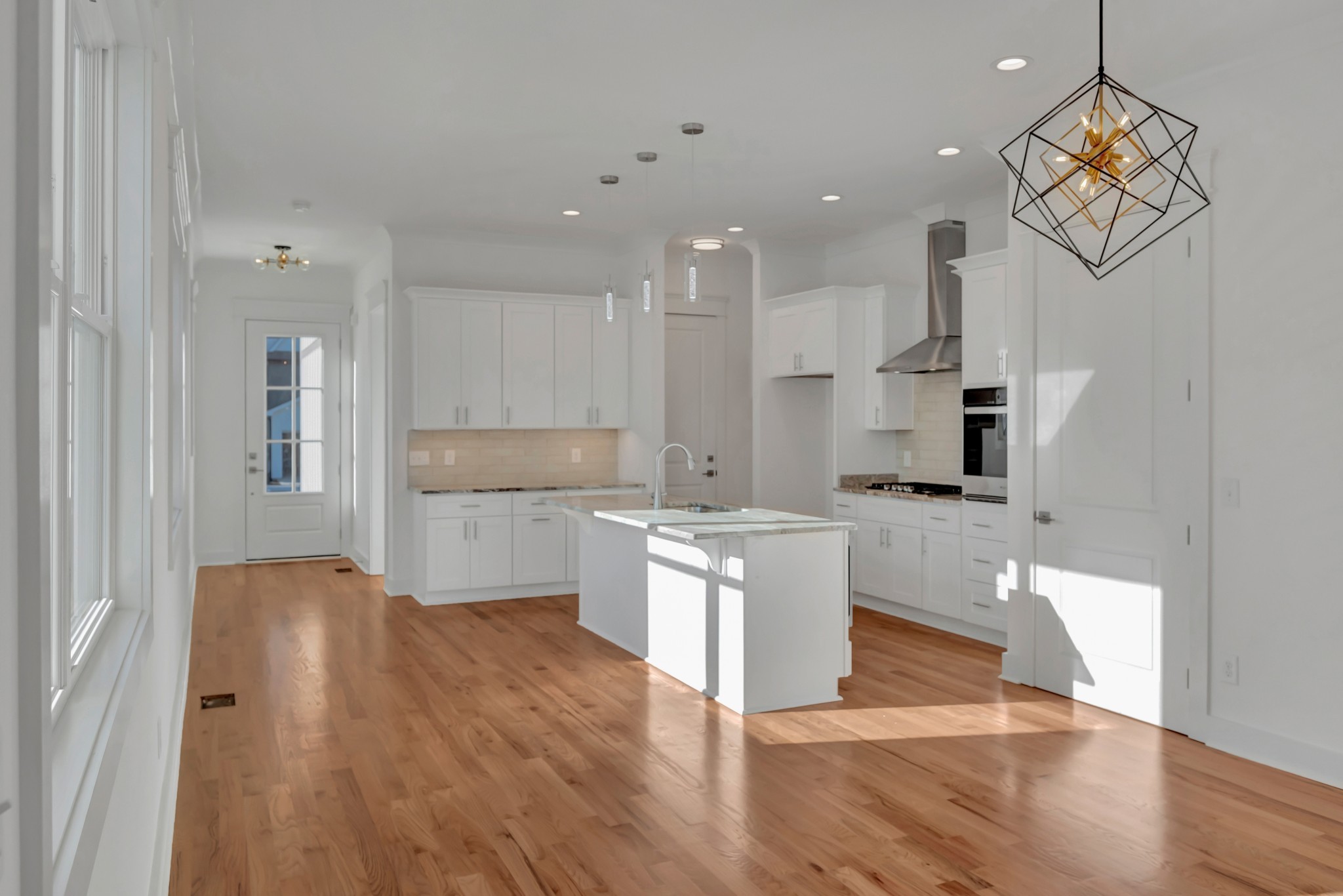 520 Croley Drive, Unit A (RIGHT SIDE) Nashville, TN 37209 - Photo 10 of 39 a large kitchen with cabinets wooden floor and stainless steel appliances
