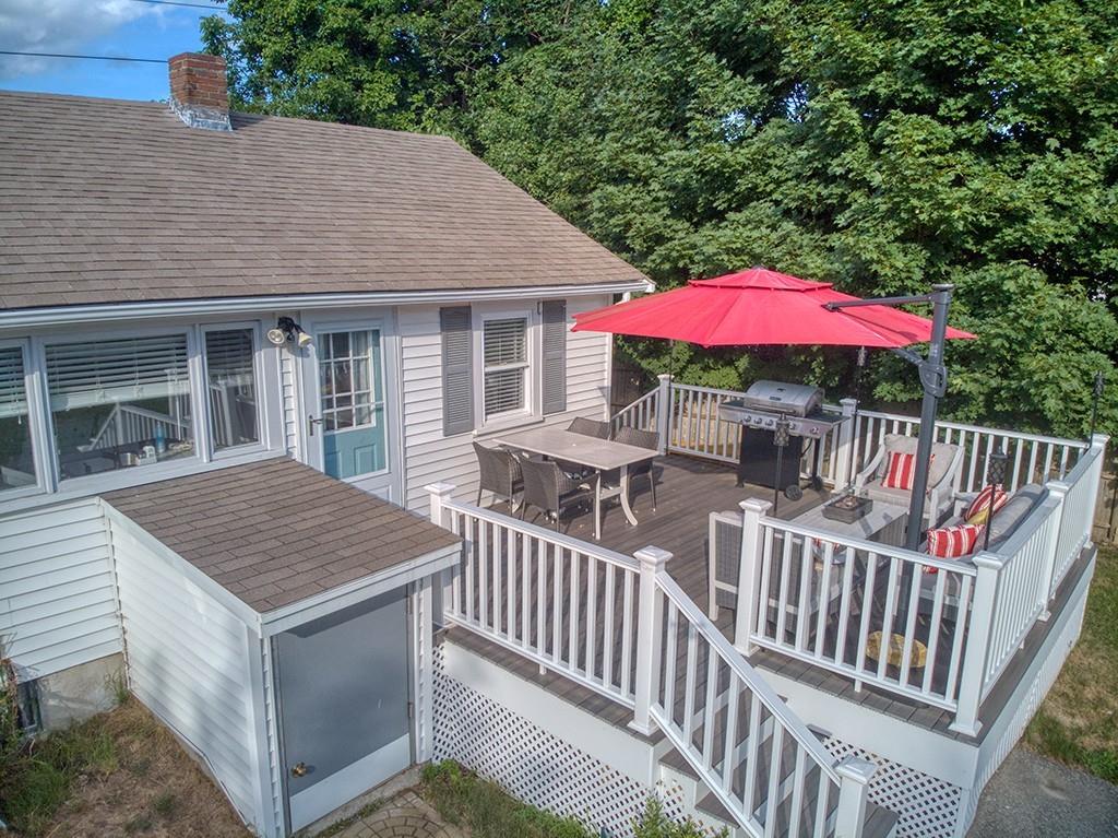 645 Boston Road Billerica, MA 01821 - Photo 3 of 18 a view of house with deck and outdoor seating