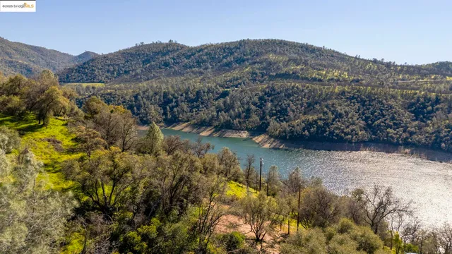 a view of lake with mountain