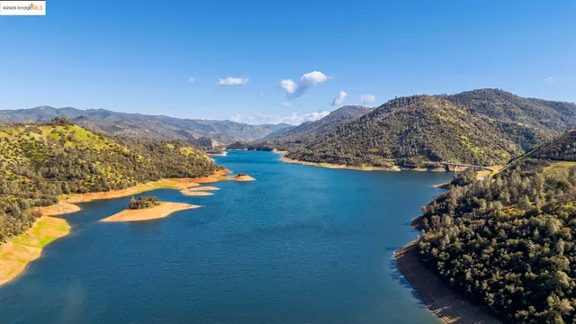 a view of a houses with a yard