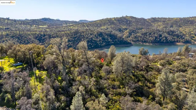 a view of a lake with mountains in the background
