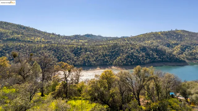 a view of lake with mountain