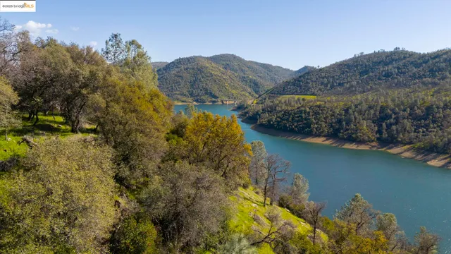 a view of a lake with a mountain in the background