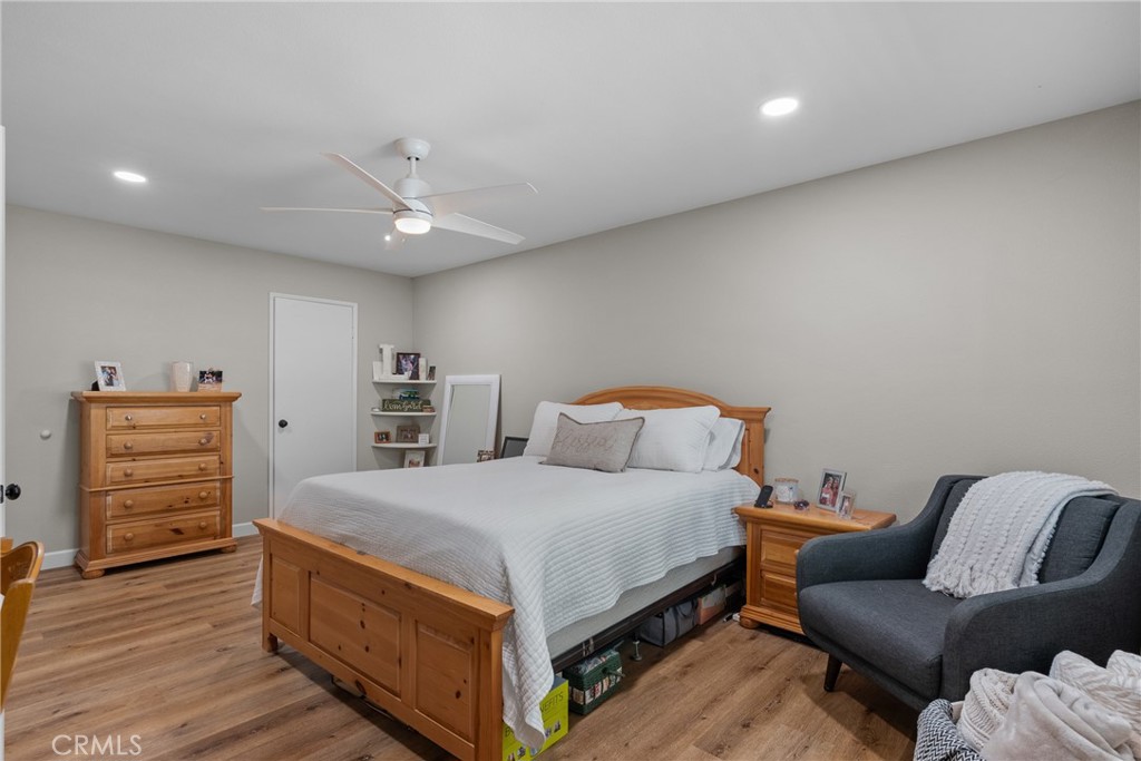 28818 Oak Springs Canyon Road Canyon Country, CA 91387 - Photo 14 of 38 a bedroom with a bed and a couch