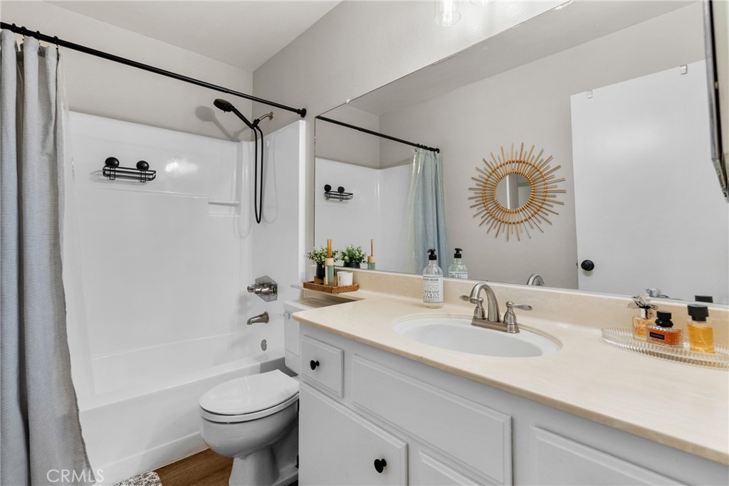 28818 Oak Springs Canyon Road Canyon Country, CA 91387 - Photo 19 of 38 a bathroom with a sink a toilet and a mirror