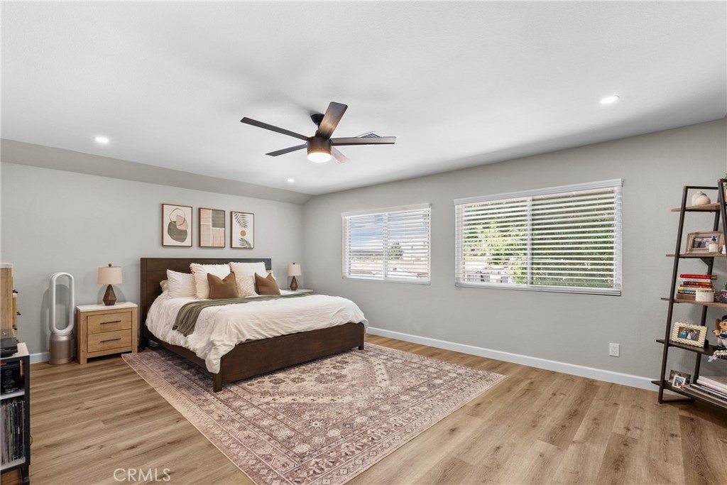 28818 Oak Springs Canyon Road Canyon Country, CA 91387 - Photo 22 of 38 a spacious bedroom with a large bed and a window