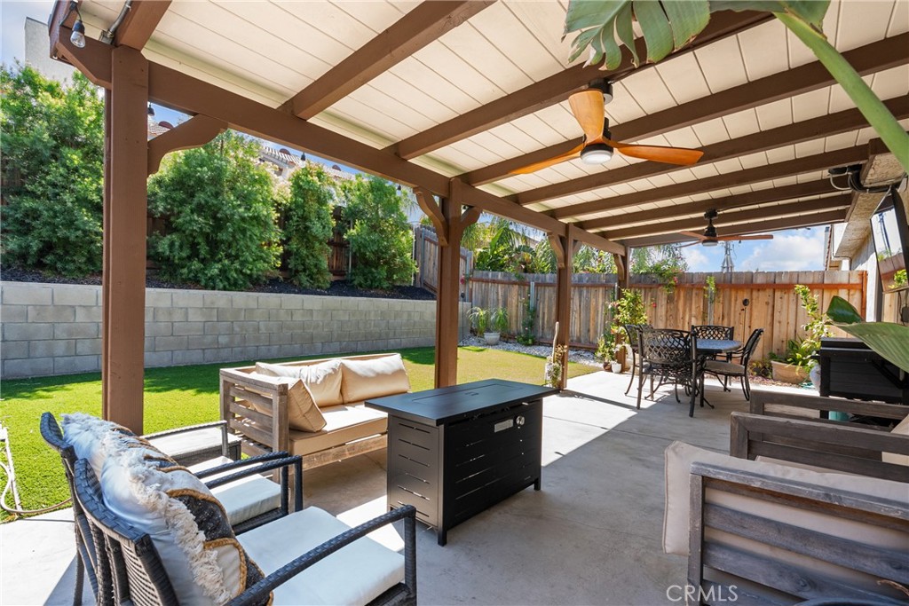 28818 Oak Springs Canyon Road Canyon Country, CA 91387 - Photo 31 of 38 a outdoor space with patio the couches and pool table with chairs