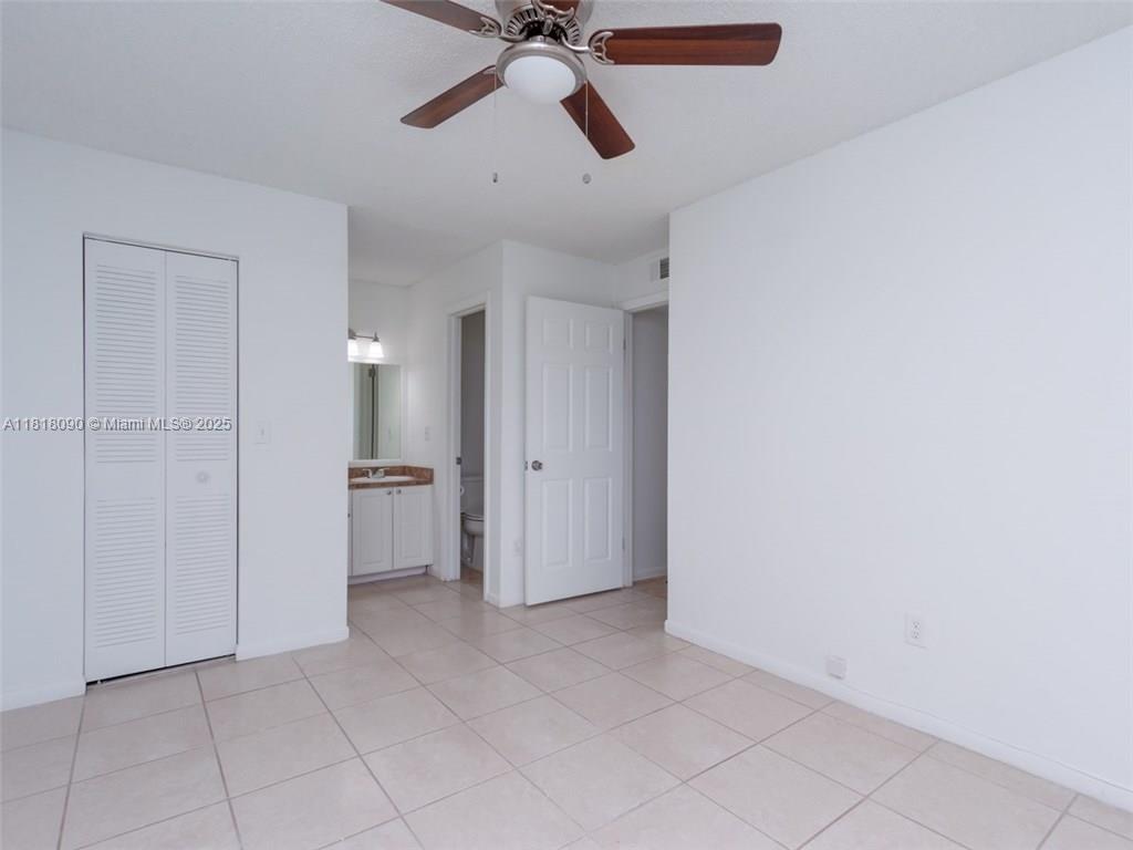1235 Southwest 46th Avenue, Unit 707 Pompano Beach, FL 33069 - Photo 12 of 15 a view of an empty room