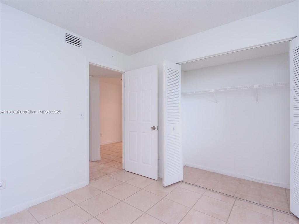1235 Southwest 46th Avenue, Unit 707 Pompano Beach, FL 33069 - Photo 14 of 15 a view of an empty room
