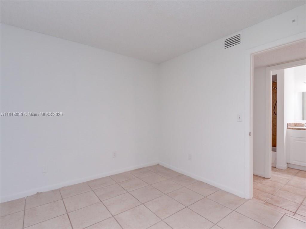 1235 Southwest 46th Avenue, Unit 707 Pompano Beach, FL 33069 - Photo 15 of 15 a view of an empty room
