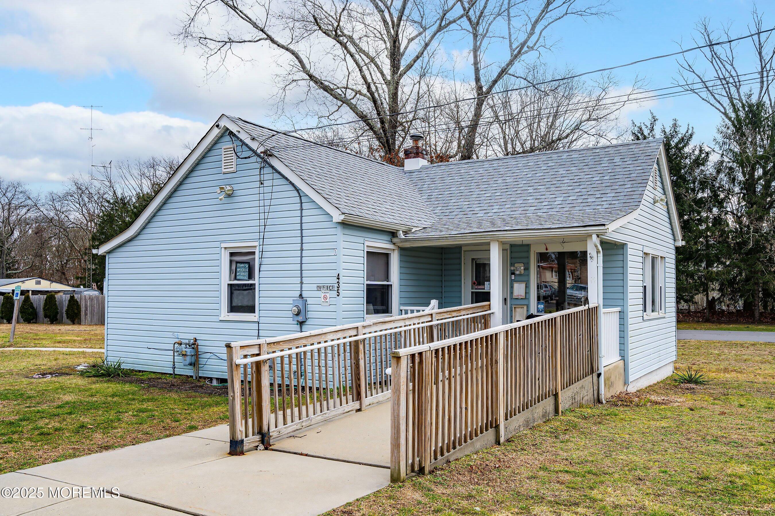 819 North Street Jackson, NJ 08527 - Photo 14 of 16 a front view of a house with a yard