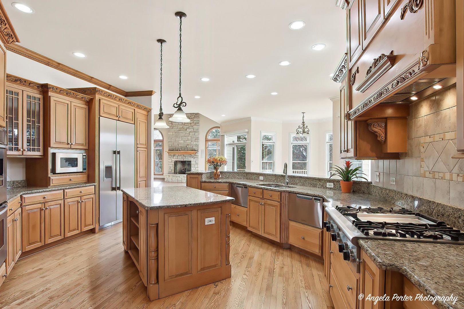 3513 Deep Wood Drive Crystal Lake, IL 60012 - Photo 12 of 71 a kitchen with stainless steel appliances granite countertop a stove and a sink