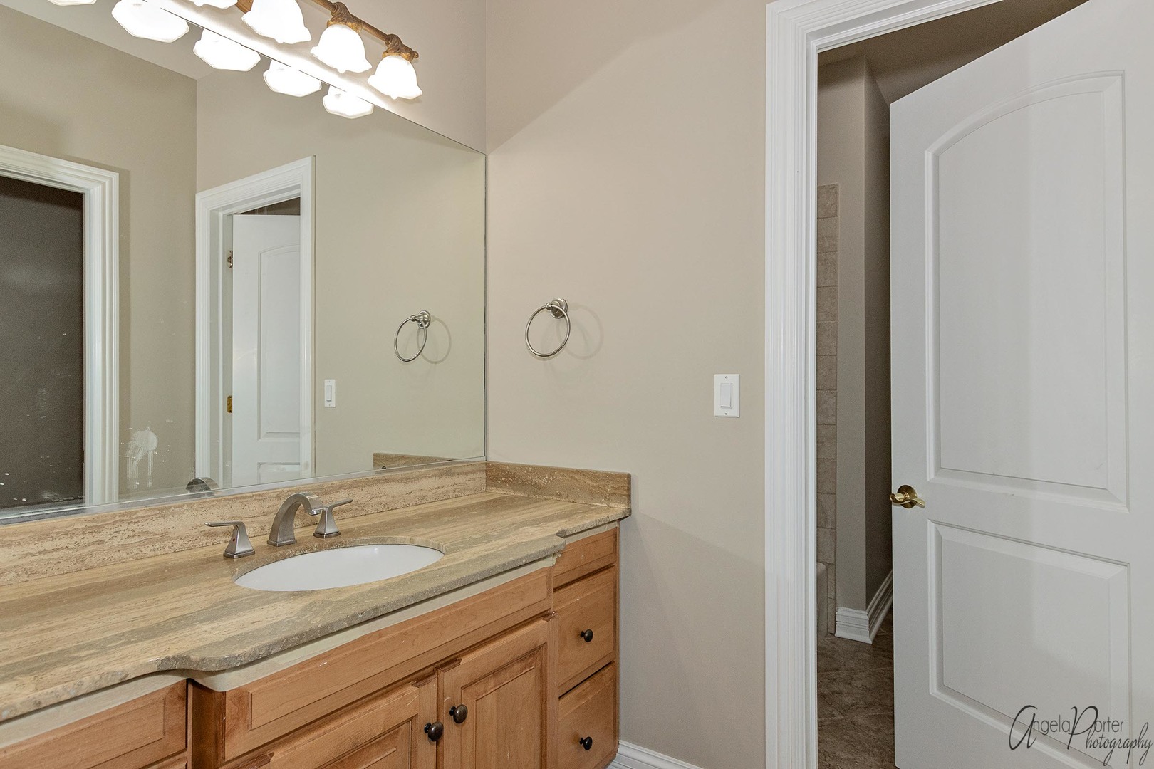 3513 Deep Wood Drive Crystal Lake, IL 60012 - Photo 37 of 71 a bathroom with a granite countertop sink and a mirror