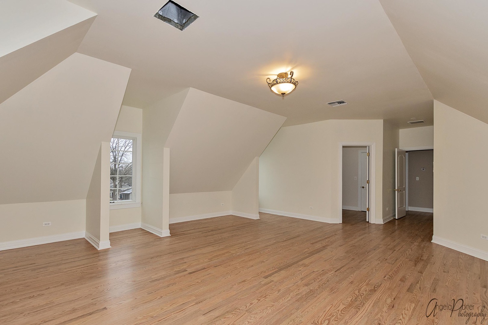3513 Deep Wood Drive Crystal Lake, IL 60012 - Photo 41 of 71 an empty room with wooden floor and windows