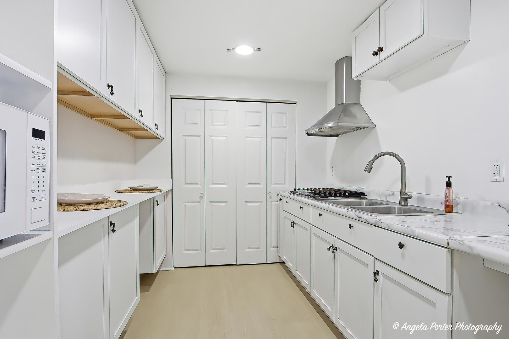 3513 Deep Wood Drive Crystal Lake, IL 60012 - Photo 52 of 71 a kitchen with a sink stove and refrigerator