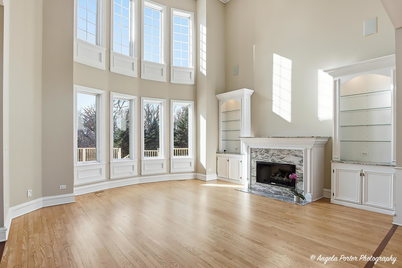 3513 Deep Wood Drive Crystal Lake, IL 60012 - Photo 6 of 71 a view of an empty room with a fireplace and a window