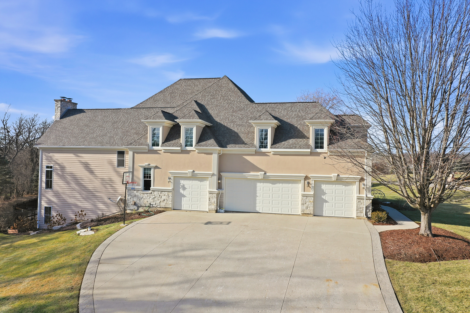 3513 Deep Wood Drive Crystal Lake, IL 60012 - Photo 62 of 71 a front view of a house with a yard