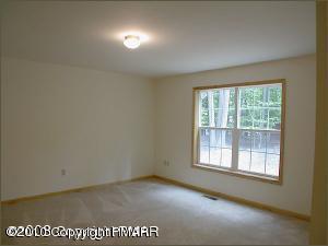 1408 Ridge Road Pocono Lake, PA 18347 - Photo 4 of 5 an empty room with a window