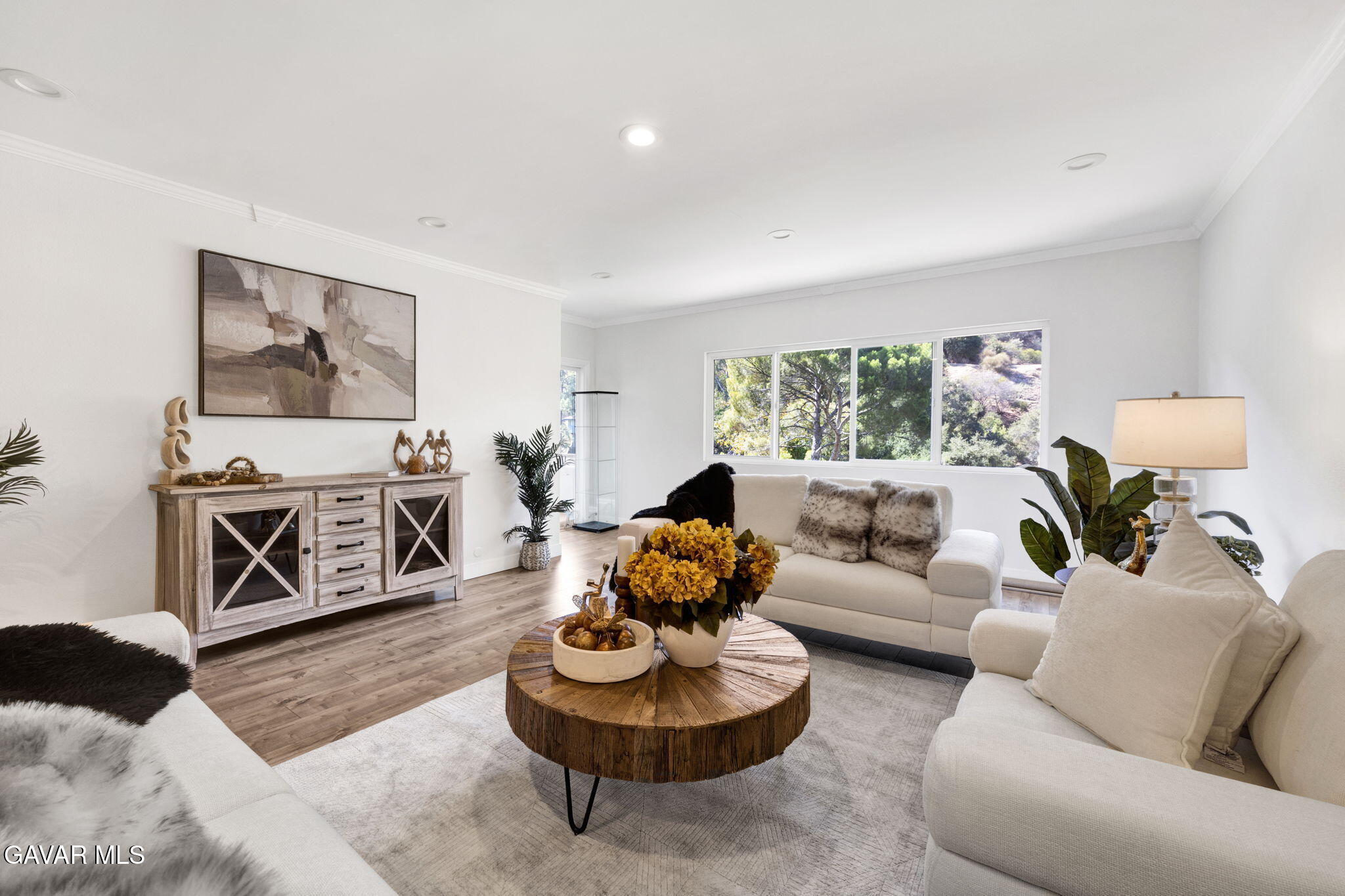 1935 Alpha Road, Unit 112 Glendale, CA 91208 - Photo 7 of 23 a living room with furniture and a couch