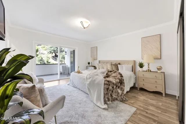 a bed room with furniture and a couch