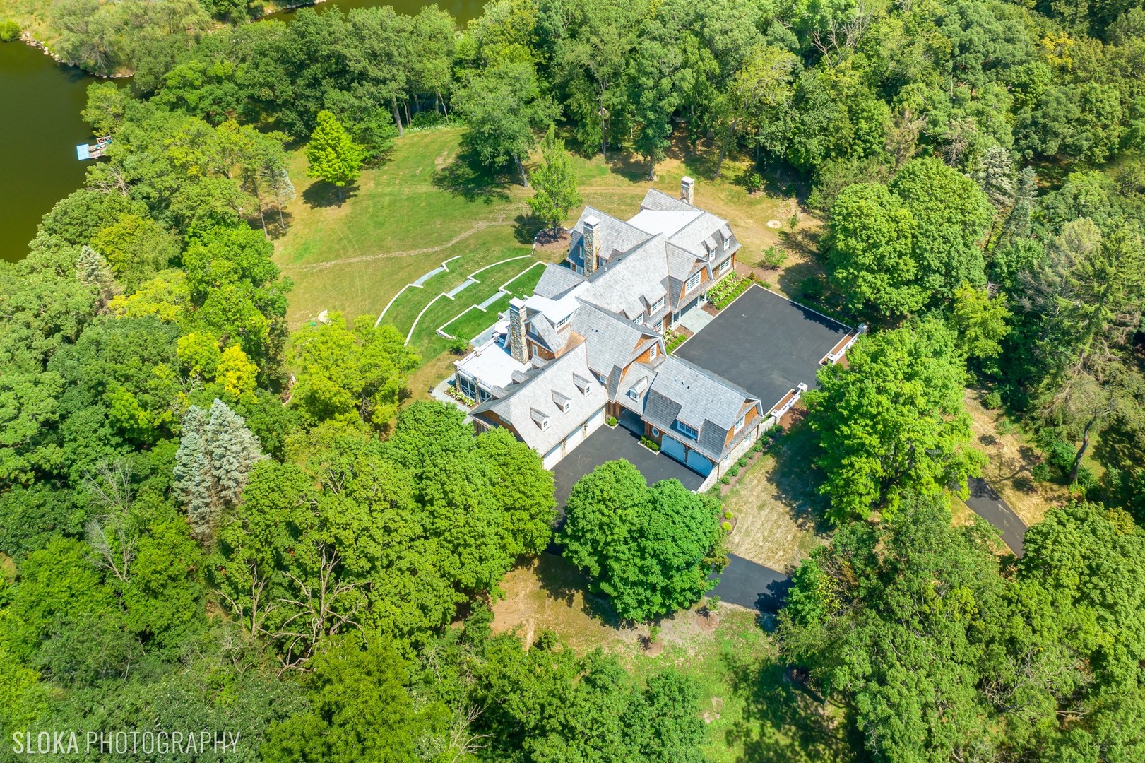 48 Brinker Road Barrington Hills, IL 60010 - Photo 102 of 108 an aerial view of residential house with outdoor space and trees all around