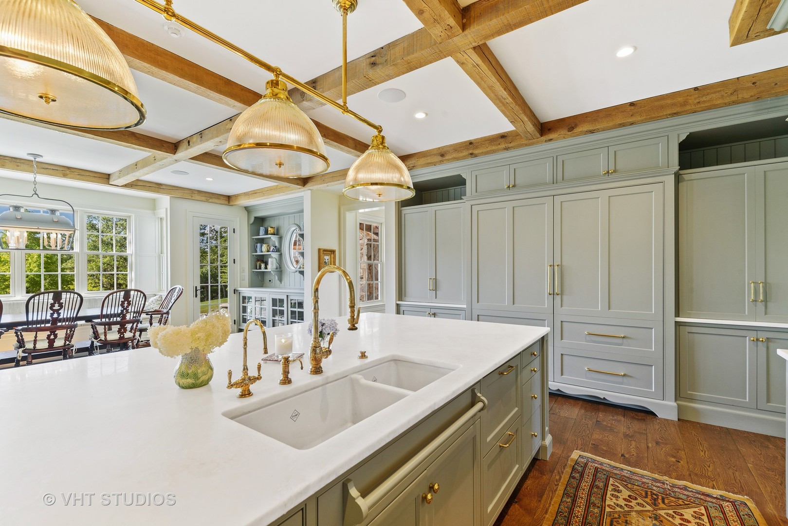 48 Brinker Road Barrington Hills, IL 60010 - Photo 24 of 108 a view of a kitchen with a sink and cabinet with wooden floor
