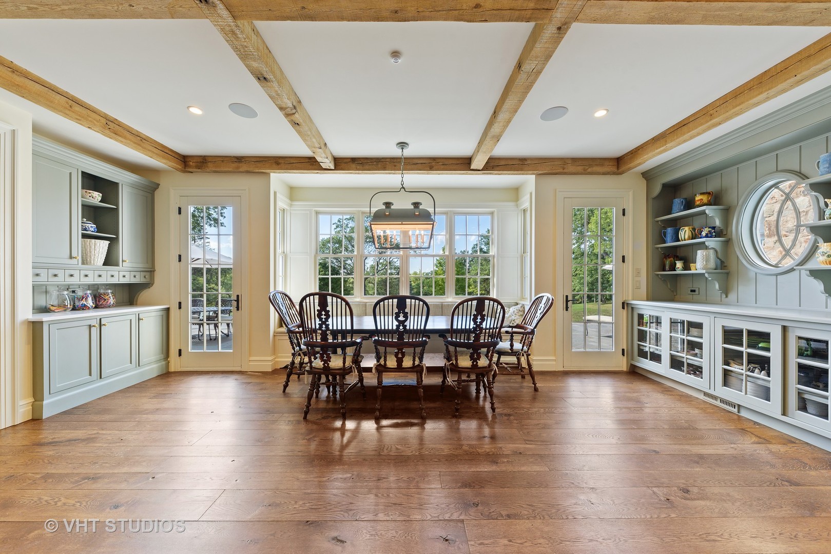 48 Brinker Road Barrington Hills, IL 60010 - Photo 27 of 108 a view of a dining room with furniture window and wooden floor