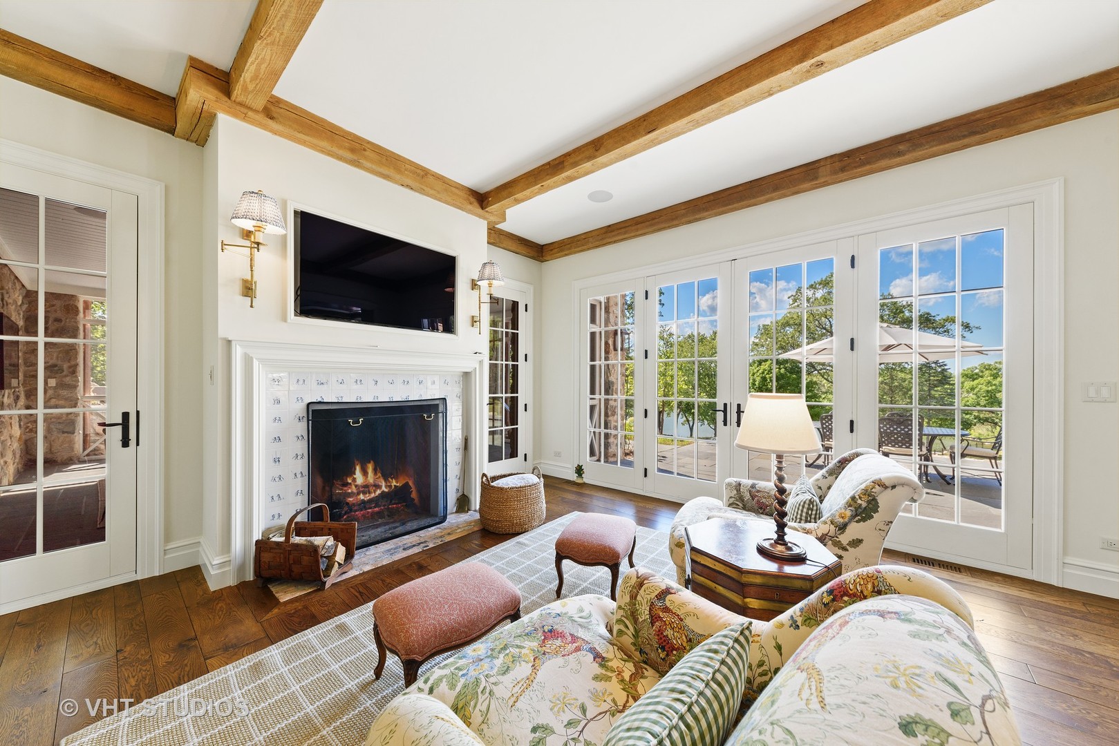 48 Brinker Road Barrington Hills, IL 60010 - Photo 35 of 108 a living room with furniture a fireplace and a flat screen tv