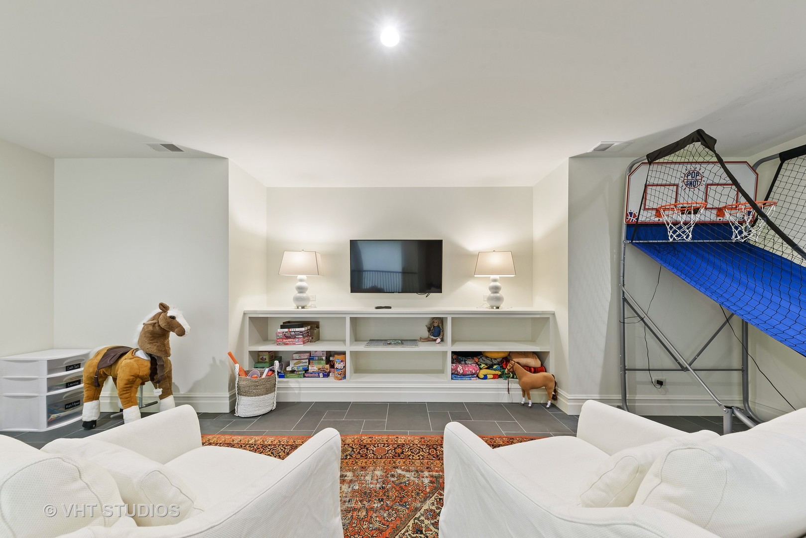48 Brinker Road Barrington Hills, IL 60010 - Photo 79 of 108 a living room with furniture and a flat screen tv
