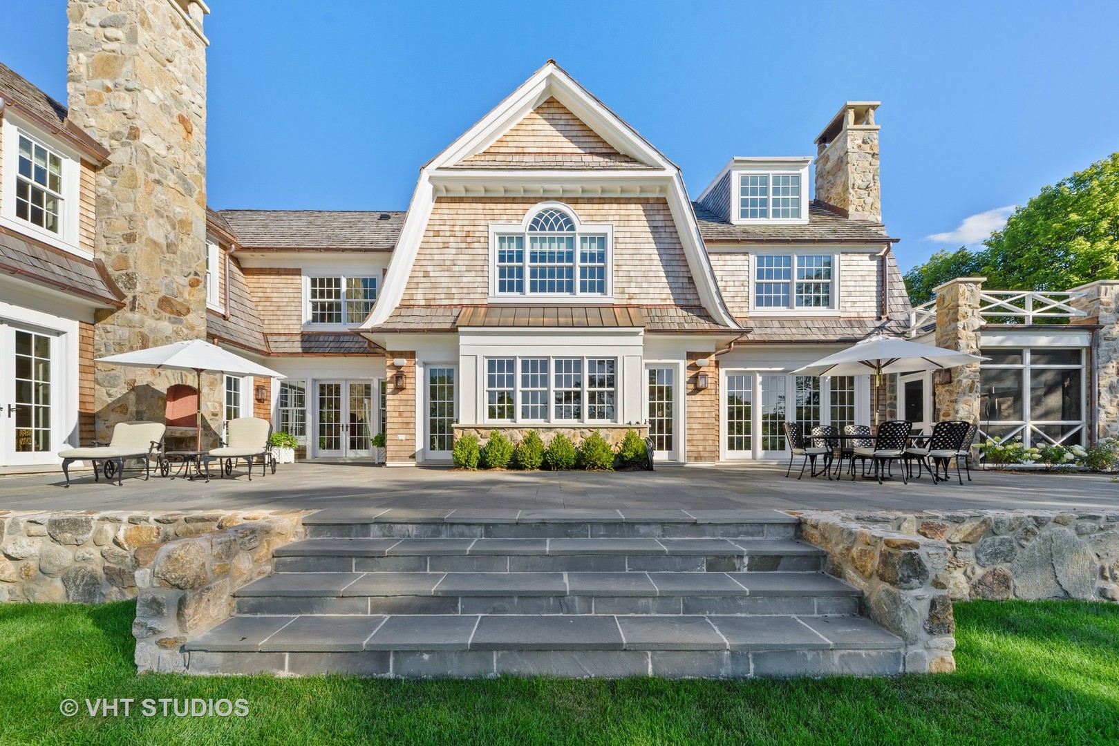 48 Brinker Road Barrington Hills, IL 60010 - Photo 89 of 108 a front view of a residential apartment building with a yard
