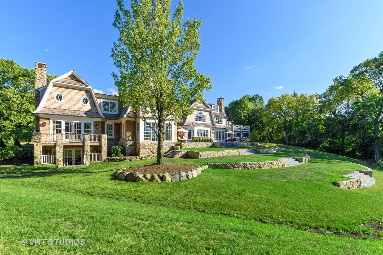 48 Brinker Road Barrington Hills, IL 60010 - Photo 91 of 108 a front view of a house with a yard table and chairs
