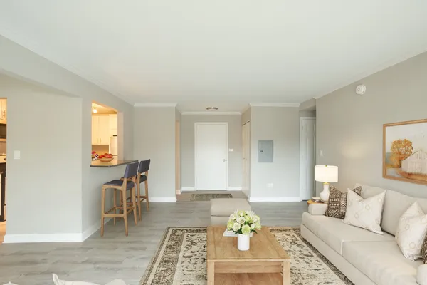 a living room with furniture and a window