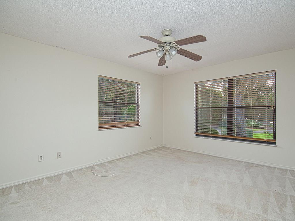 5270 Southeast Seascape Way, Unit 103 Stuart, FL 34997 - Photo 12 of 21 a view of an empty room with a window