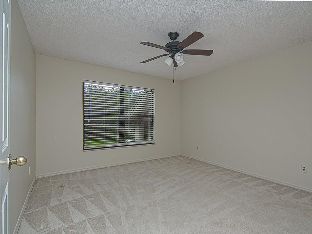 5270 Southeast Seascape Way, Unit 103 Stuart, FL 34997 - Photo 14 of 21 a view of an empty room with a window