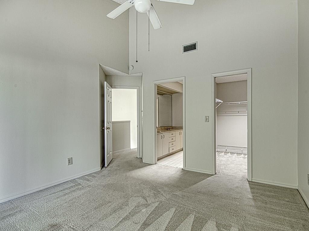 5270 Southeast Seascape Way, Unit 103 Stuart, FL 34997 - Photo 15 of 21 an empty room with a bathroom and a shower