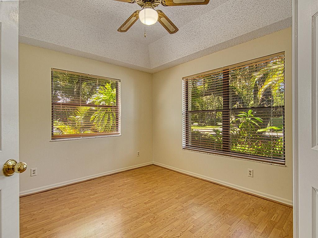 5270 Southeast Seascape Way, Unit 103 Stuart, FL 34997 - Photo 10 of 21 a view of an empty room with a window