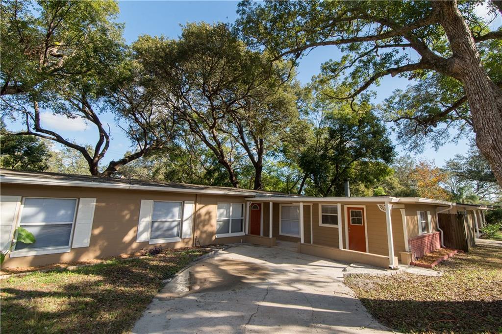 5419 Ashmeade Road Orlando, FL 32810 - Photo 1 of 1 a view of a house with backyard