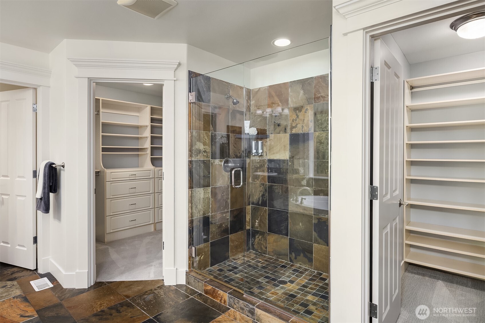 2989 Northeast Davis Loop Issaquah, WA 98029 - Photo 25 of 40 a bathroom with a shower and a glass door
