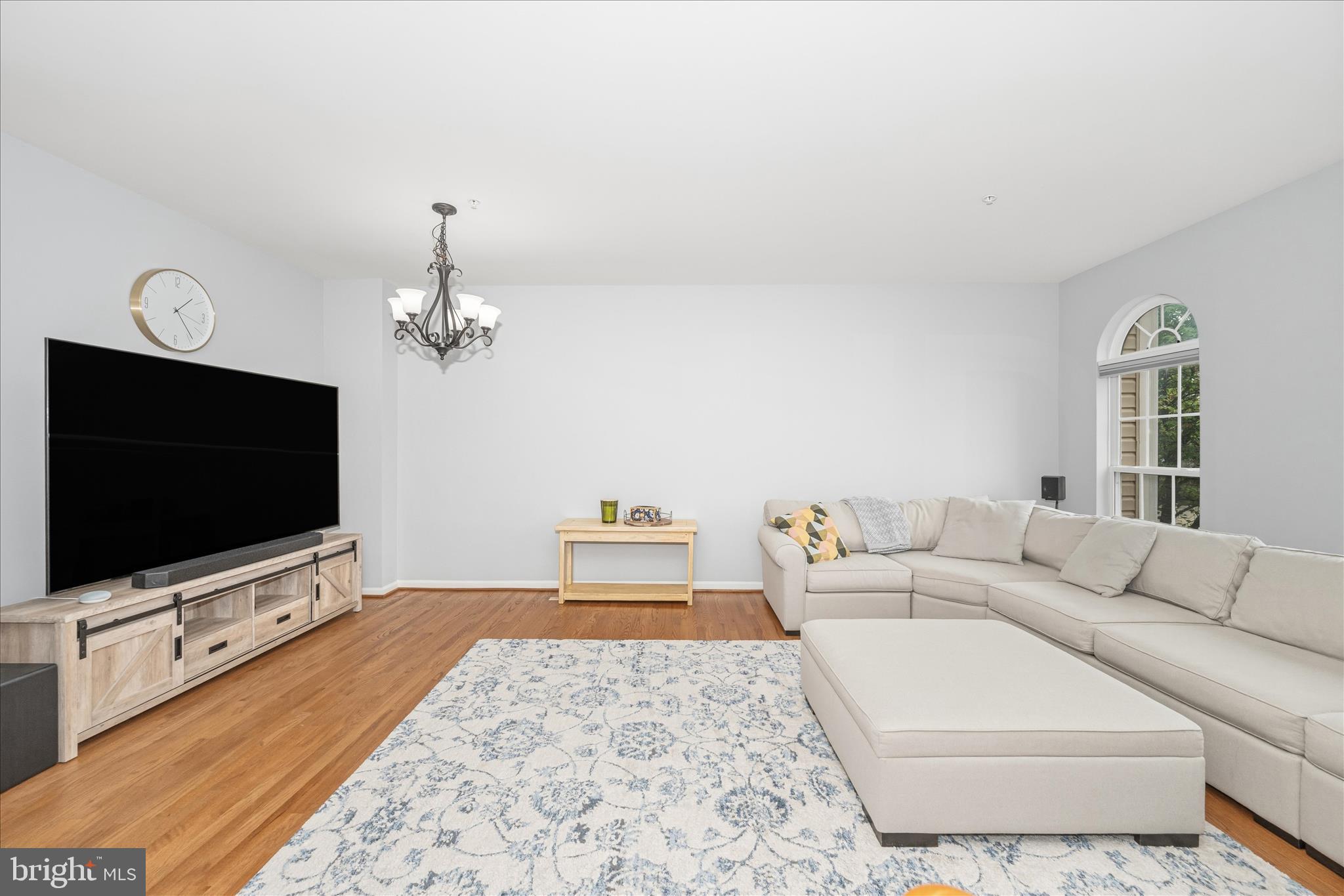 21 Inkberry Circle Gaithersburg, MD 20877 - Photo 3 of 51 a living room with furniture and a flat screen tv