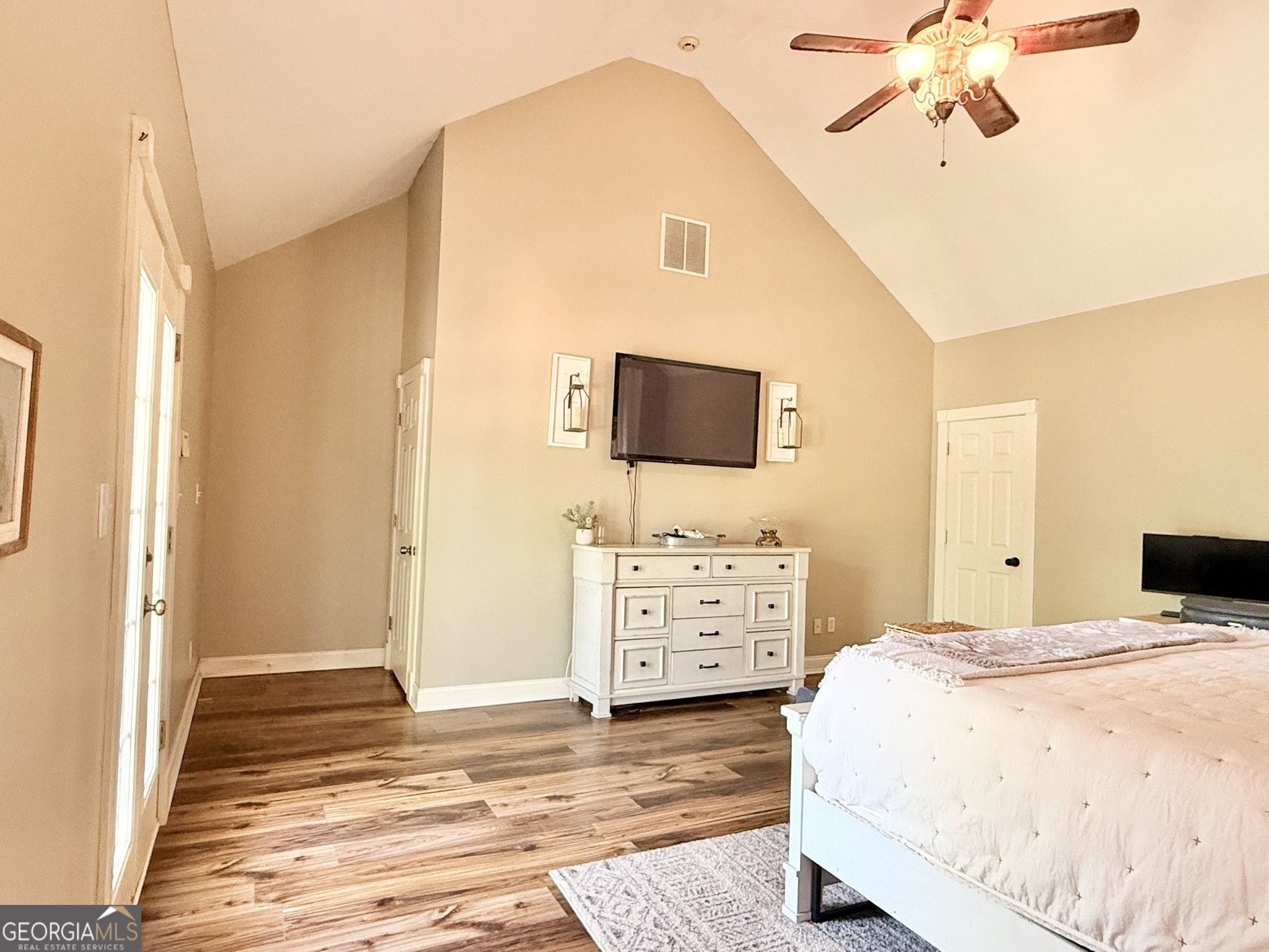 919 West Milner Road Concord, GA 30206 - Photo 32 of 40 a bedroom with a bed and a flat screen tv