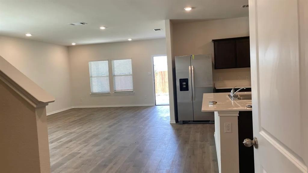 205 Redstone Lane Caddo Mills, TX 75135 - Photo 5 of 5 a view of hallway with wooden floor