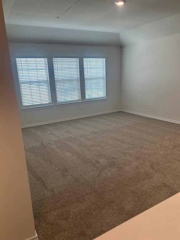 205 Redstone Lane Caddo Mills, TX 75135 - Photo 3 of 5 an empty room with windows