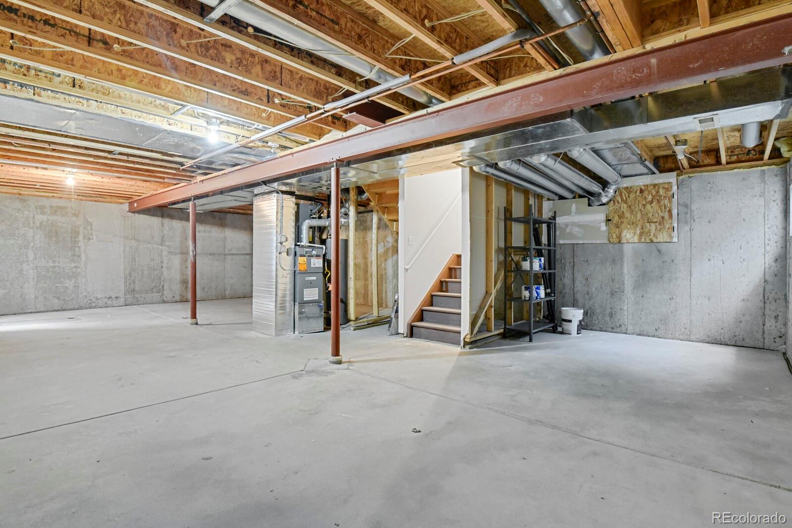 6141 Trailhead Road Highlands Ranch, CO 80130 - Photo 30 of 42 a view of an empty room with gym equipment