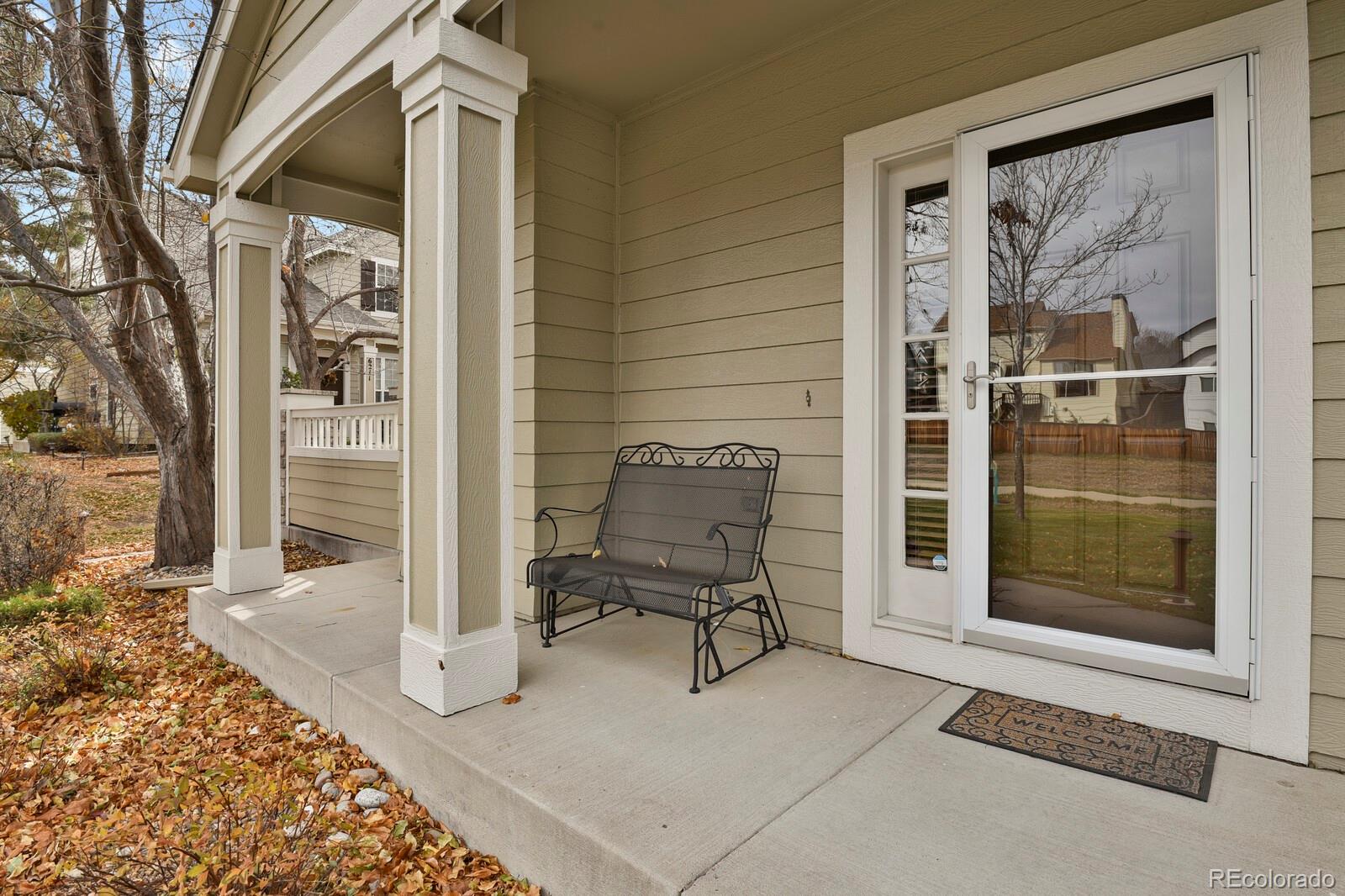 6141 Trailhead Road Highlands Ranch, CO 80130 - Photo 3 of 42 a balcony with table and chairs
