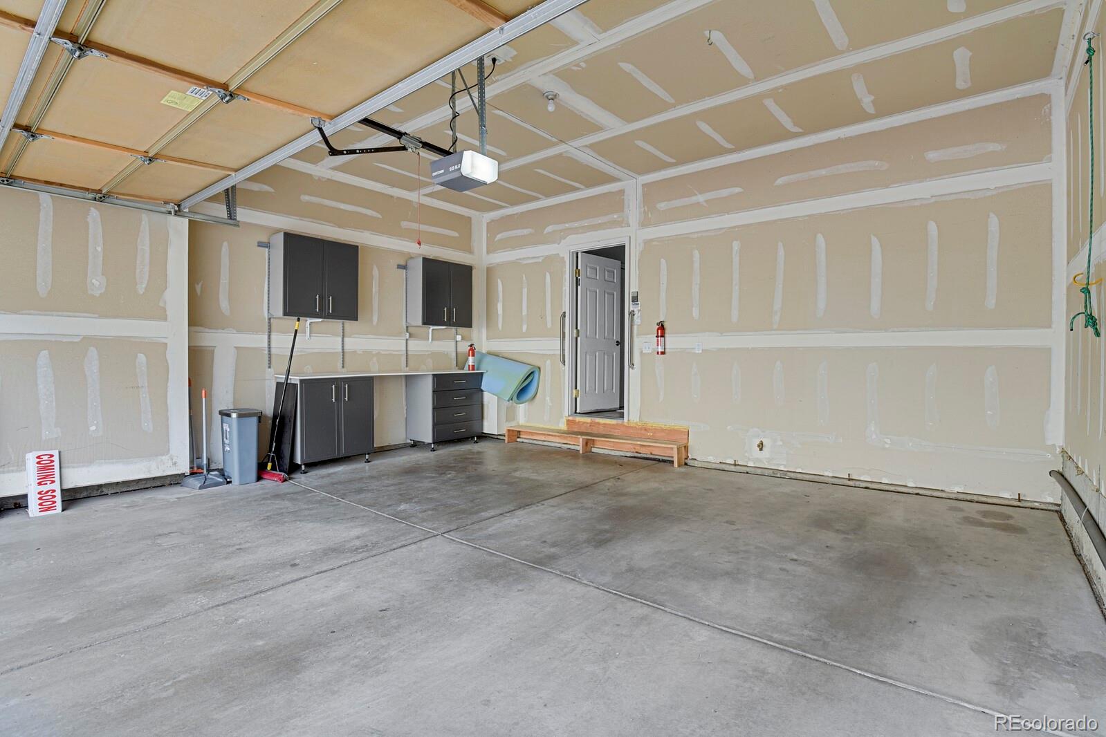 6141 Trailhead Road Highlands Ranch, CO 80130 - Photo 31 of 42 a view of empty room with washing machine and windows
