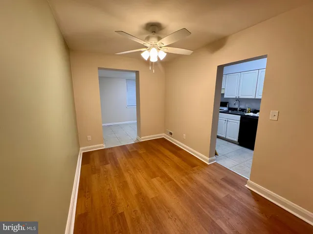 a view of a kitchen with a sink and dishwasher