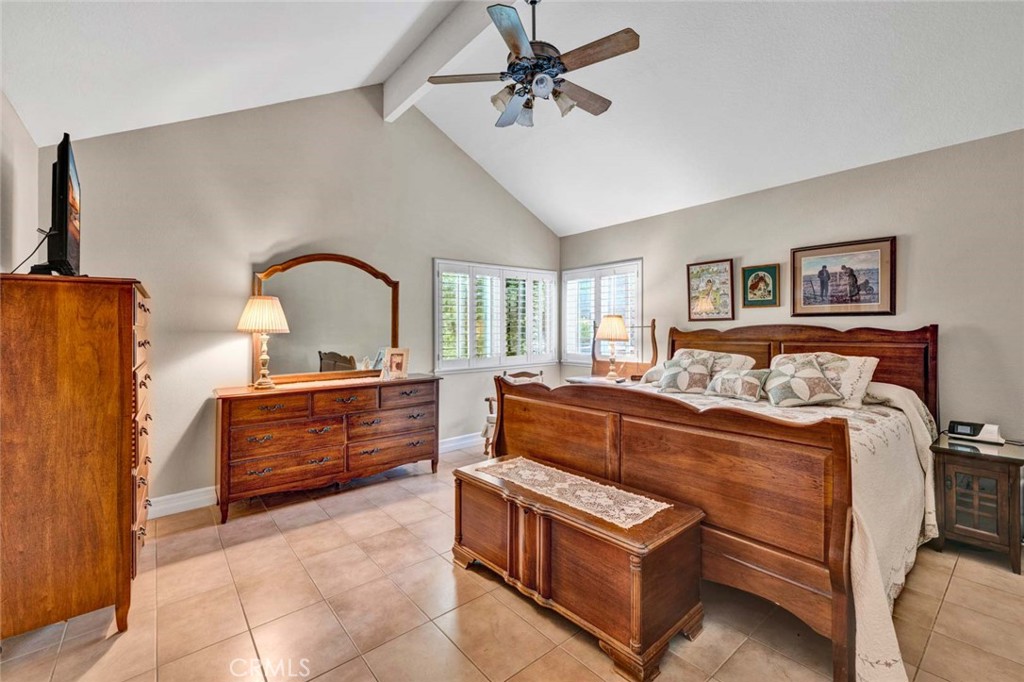 7710 East Strawberry Ridge Orange, CA 92869 - Photo 20 of 33 The primary suite has vaulted ceilings and two closet areas.